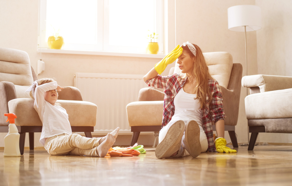 mother-daughter-feeling-exhausted-after-cleaning-home-together.jpg mother-daughter-feeling-exhausted-after-cleaning-home-together.jpg