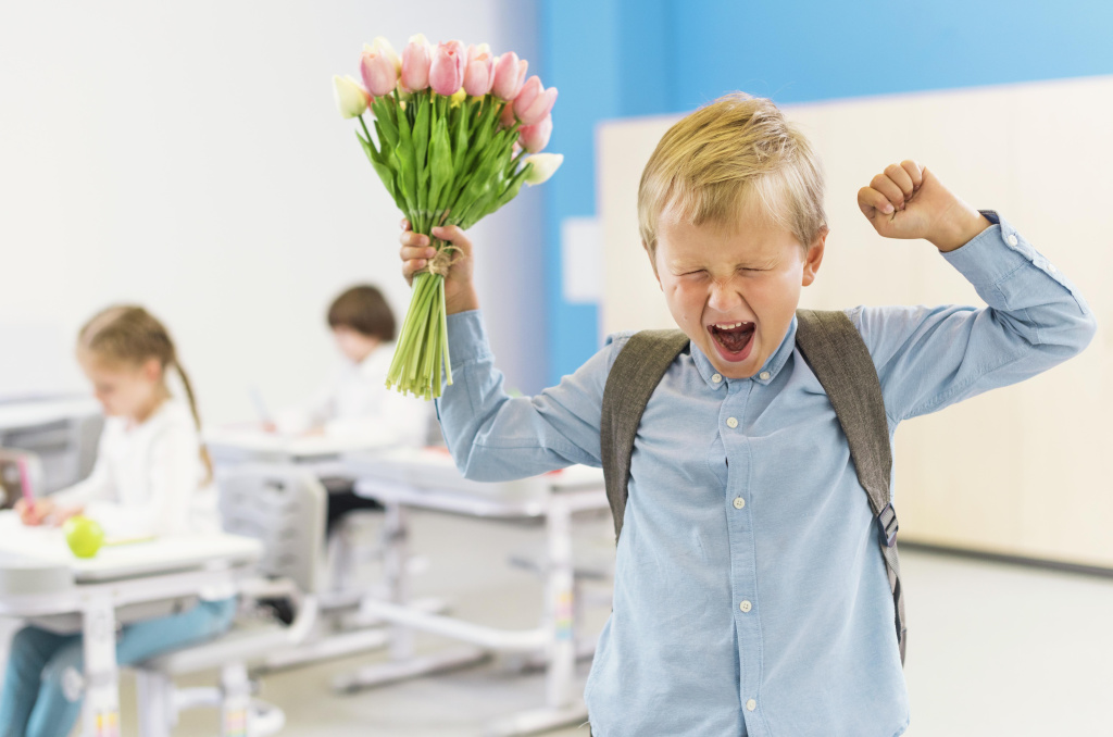 enthusiast-boy-holding-bouquet-flowers.jpg